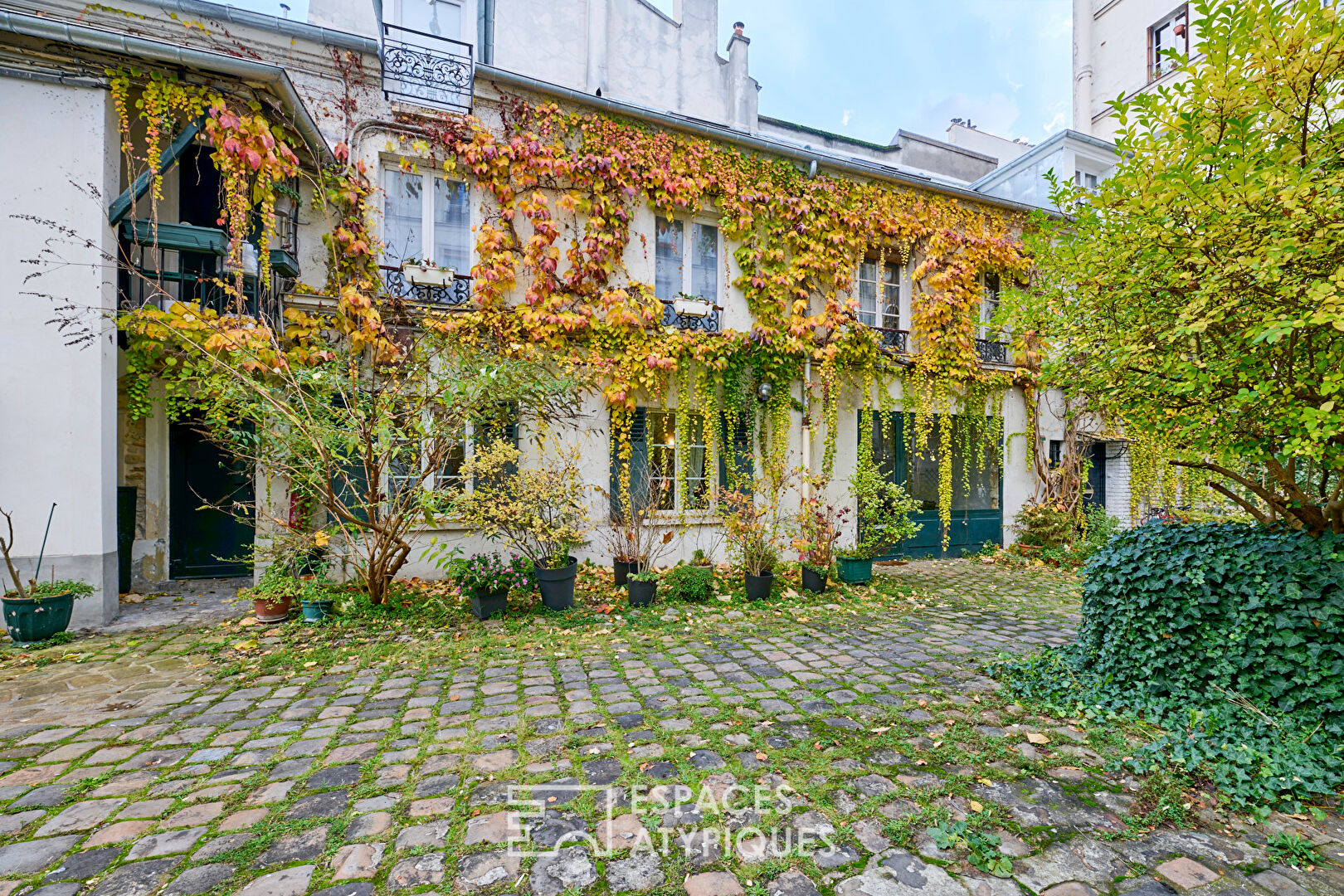 Appartement avec terrasse sur cour végétalisée