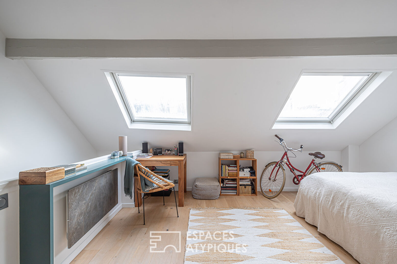 Duplex overlooking courtyard on top floor