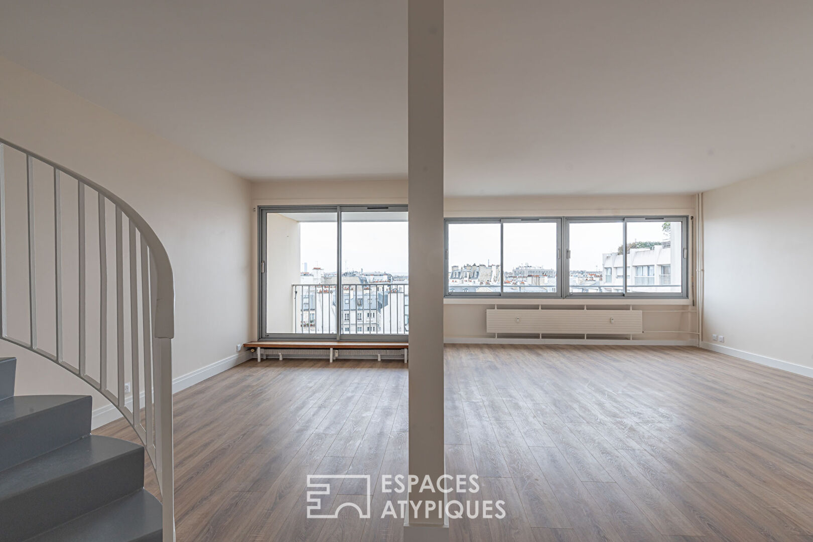 Duplex traversant en dernier étage avec vue