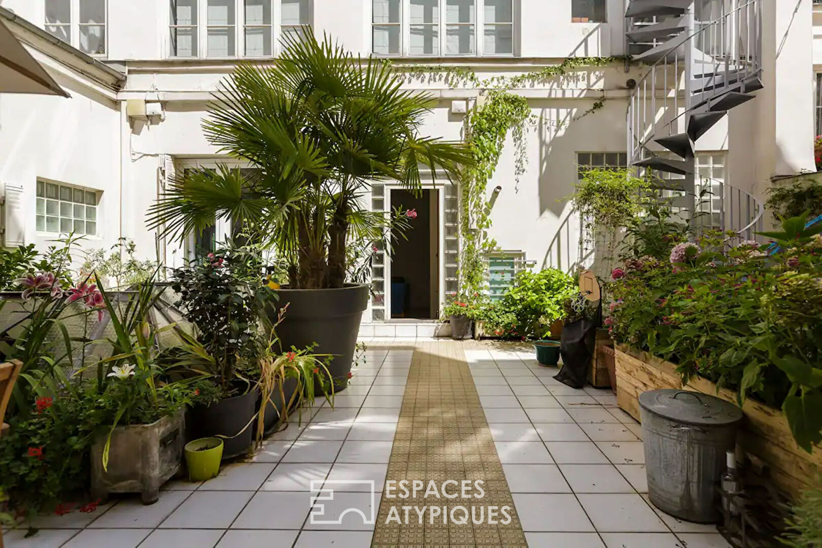 Duplex rénové avec terrasse partagée