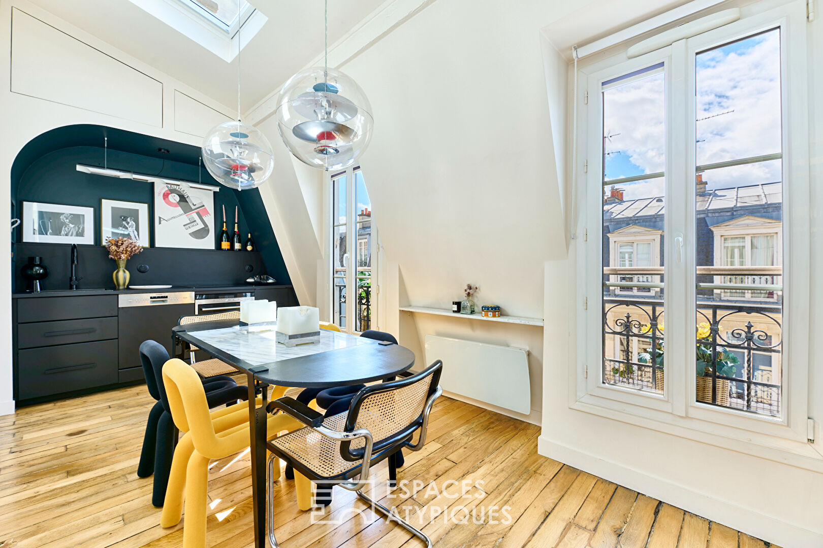 Architectural duplex on the top floor with balcony