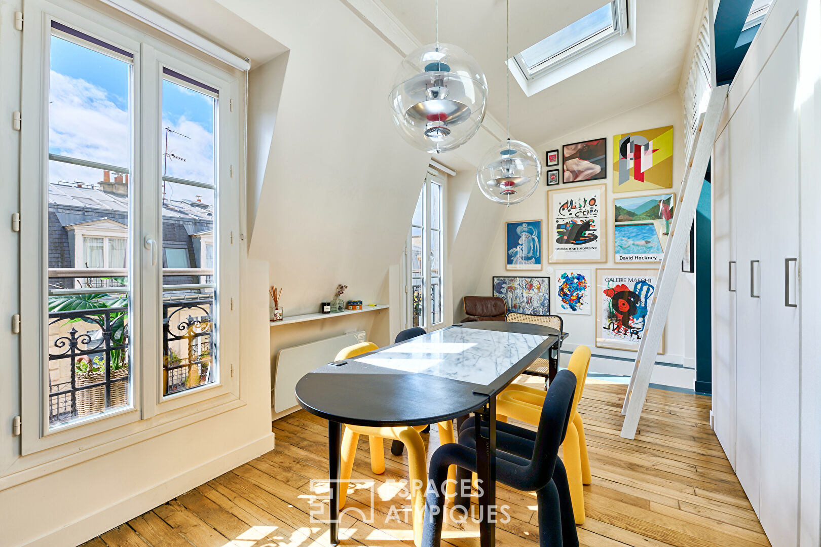 Architectural duplex on the top floor with balcony