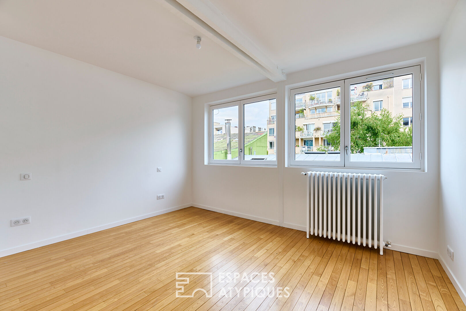 Top floor apartment with terrace in the heart of the Cité du Figuier