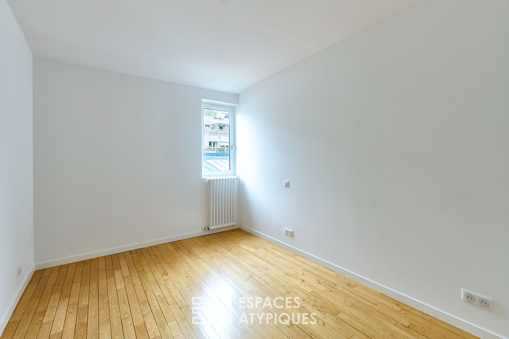 Top floor apartment with terrace in the heart of the Cité du Figuier