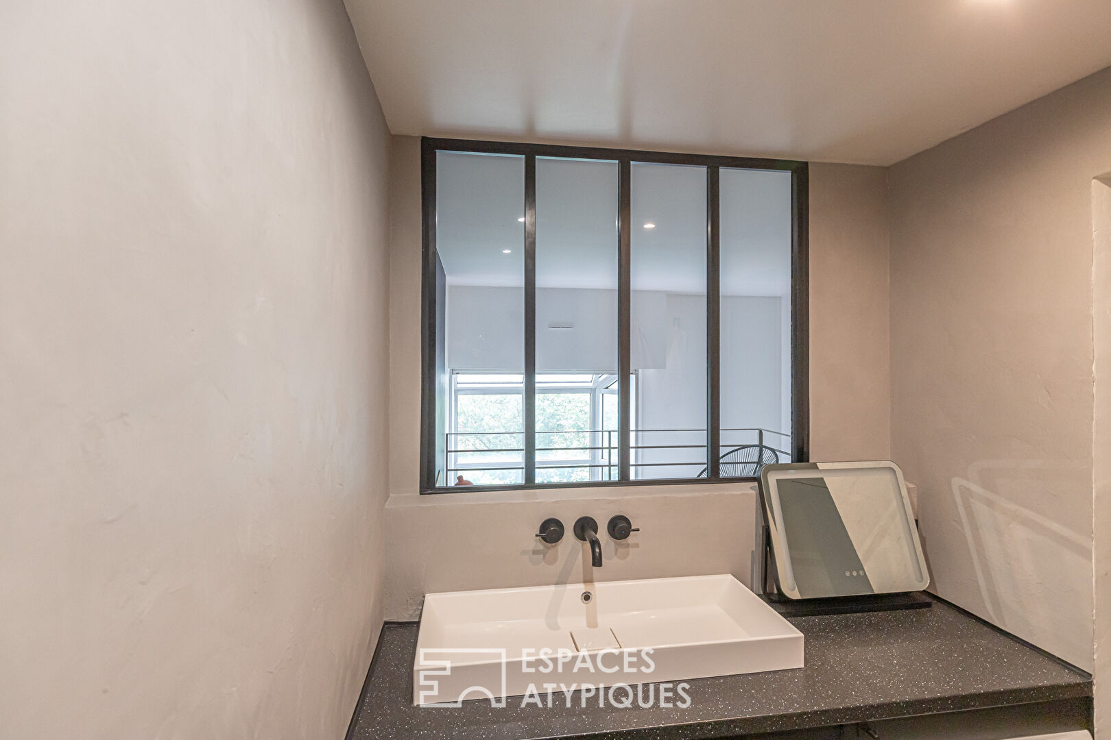 Duplex avec terrasse au rez-de-chaussée