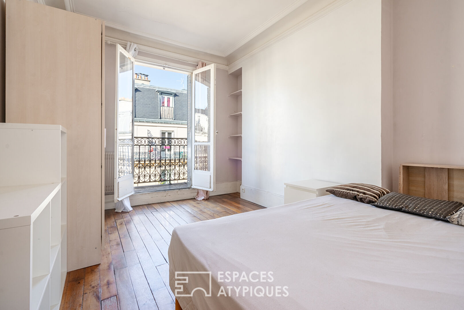 Appartement Haussmannien avec balcon et vue dégagée