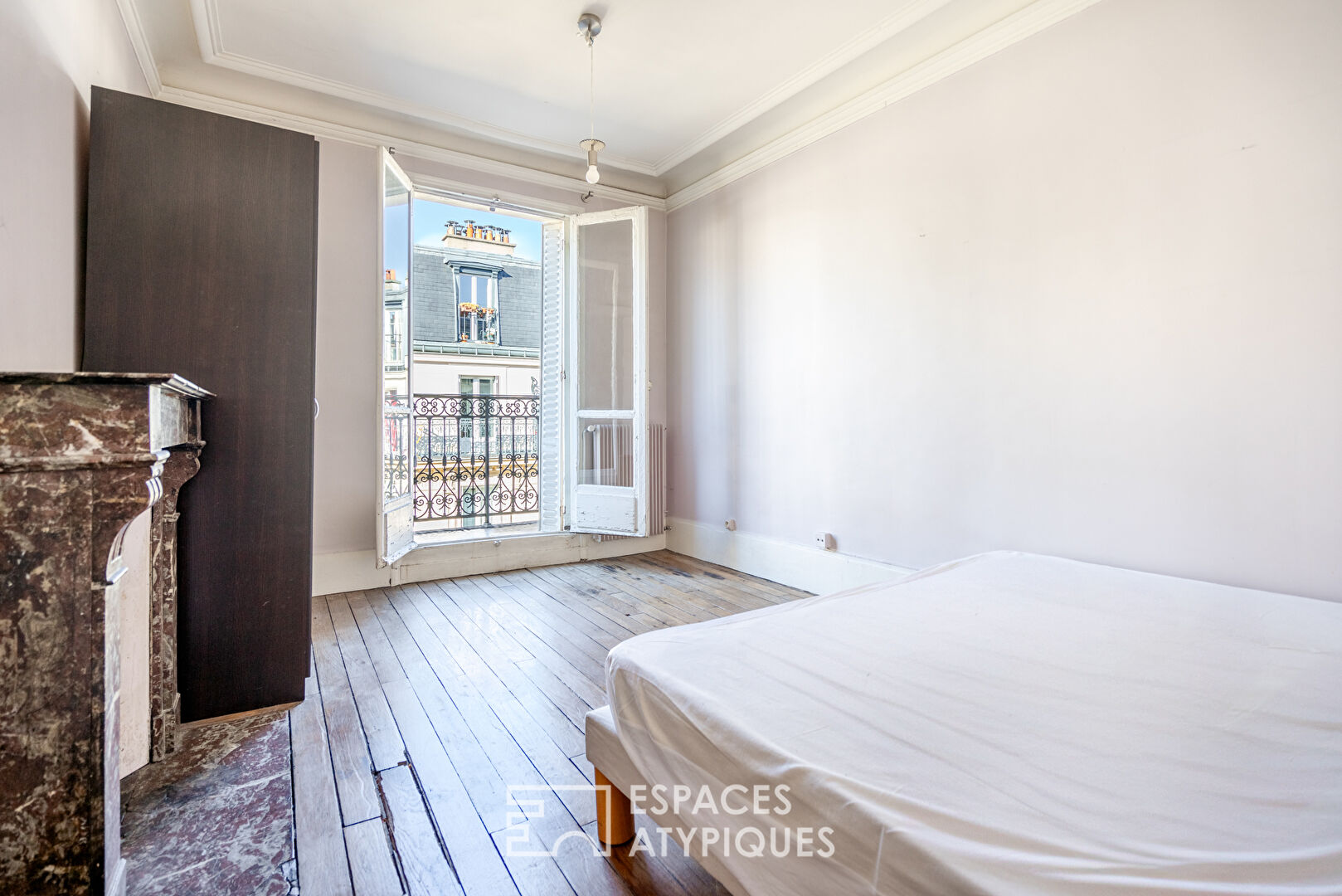 Appartement Haussmannien avec balcon et vue dégagée