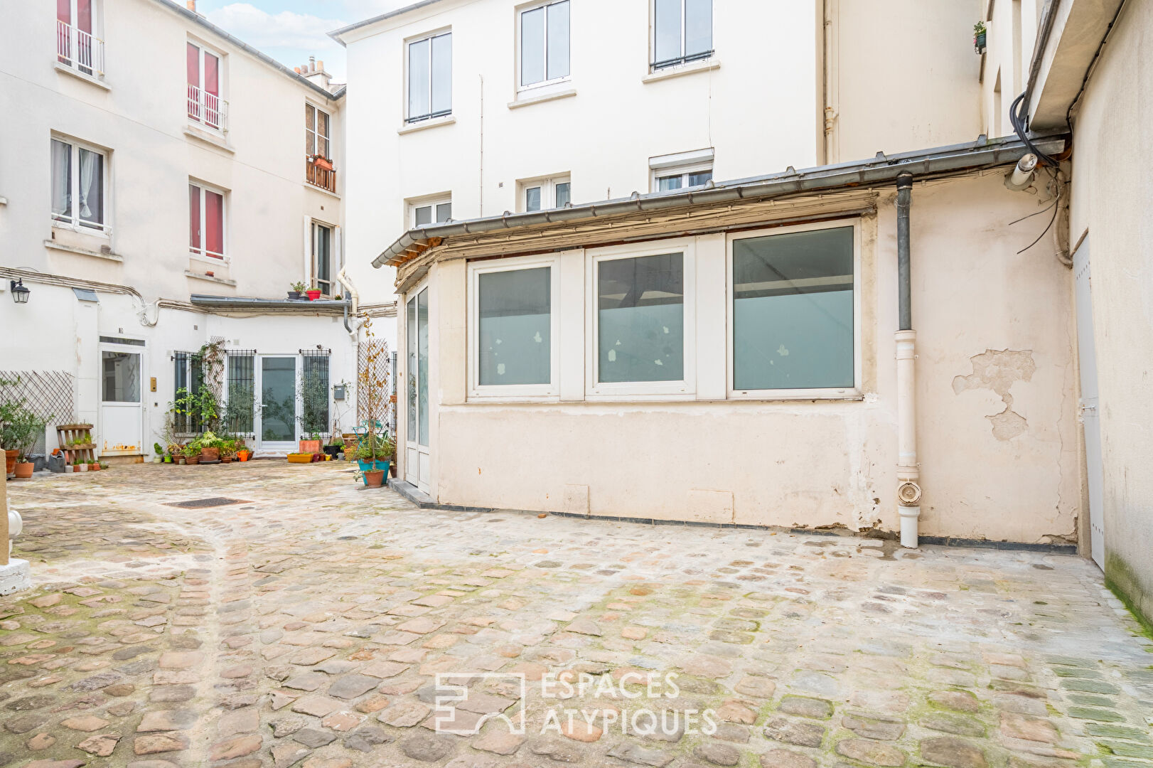 Ancien atelier sur cour à réinventer